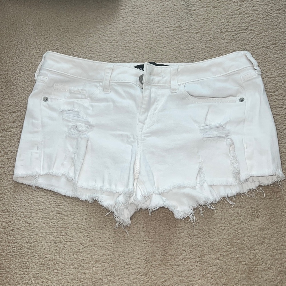 White ripped shorts!